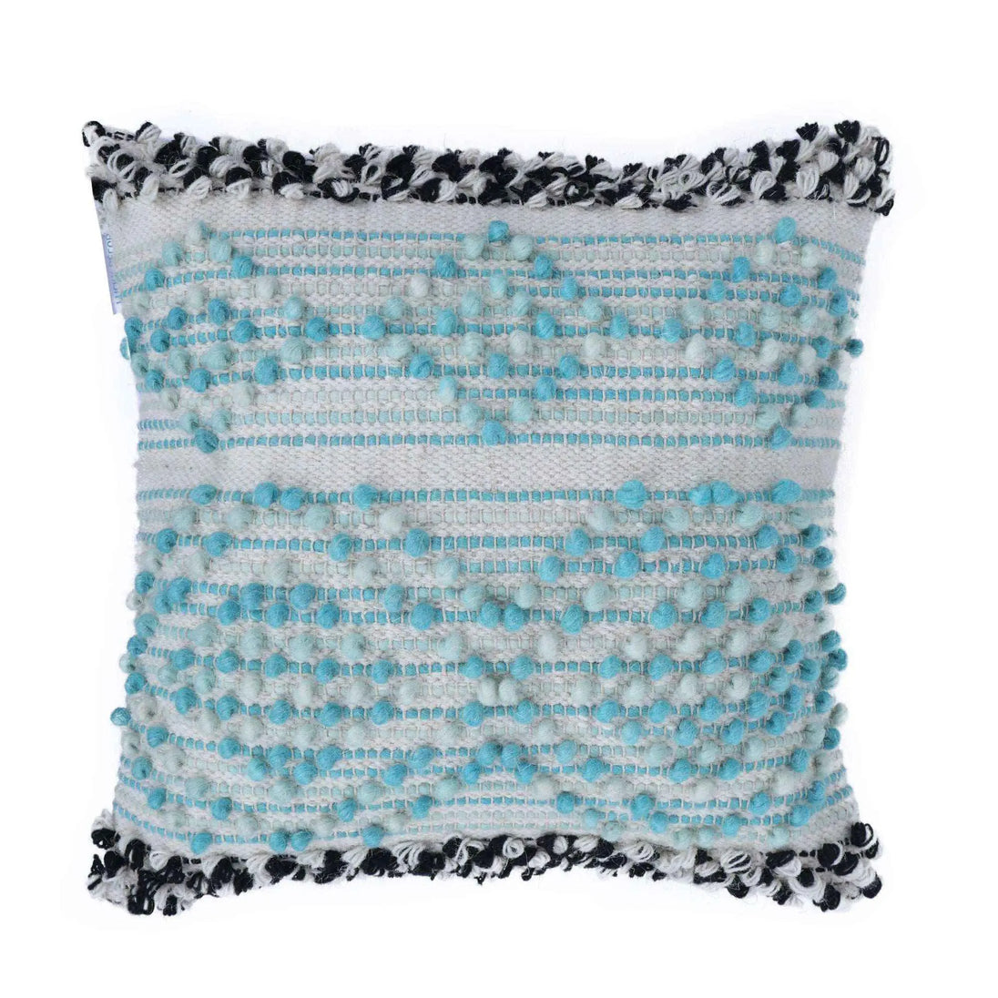 Square boho pillow cover with aqua blue and white textured woven design, featuring black and white fringe edges, ideal for modern or eclectic home decor.
