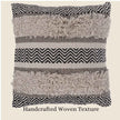 Boho textured pillow with handcrafted woven design.
