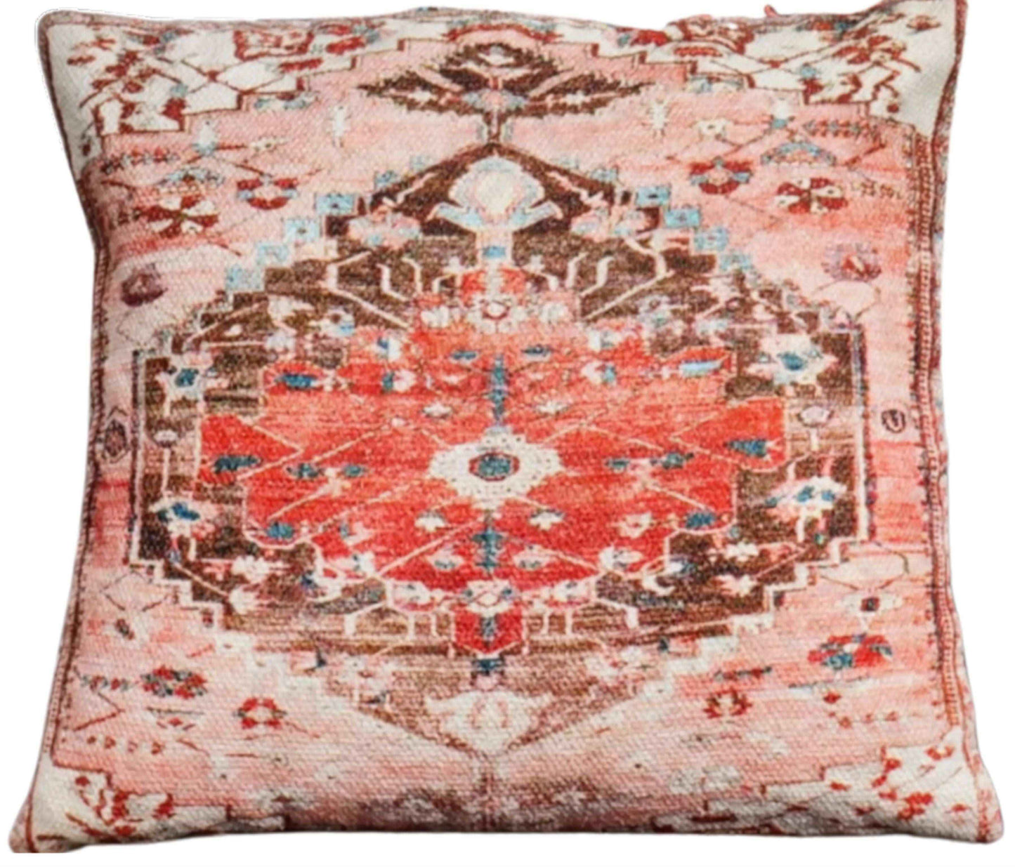 Front-facing view of a decorative throw pillow with a faded red, brown, and blue medallion pattern on a soft pink background, showcasing a vintage oriental rug-inspired design.