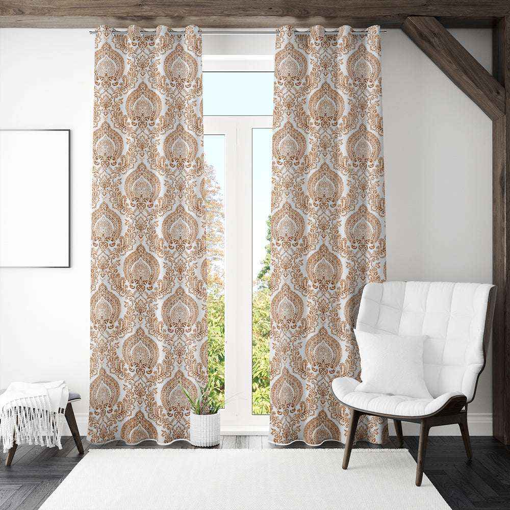 Elegant boho damask print curtains with stainless steel grommets, hanging in a modern living room with natural light, white accent chair, and minimalist decor.