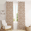 Brown damask curtains in bright cozy living space.
