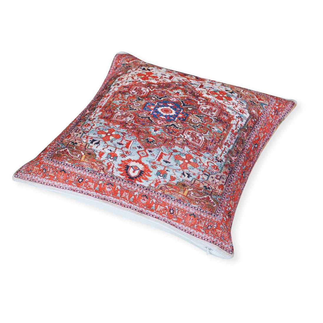 Flat-lay view of a square decorative throw pillow with a detailed red, blue, and white Persian-style medallion pattern on a white background.