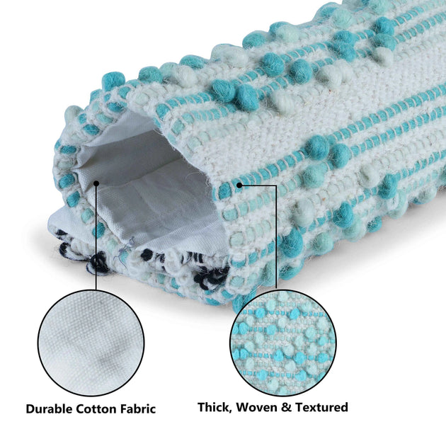 
Close-up of decorative pillow cover made from durable cotton fabric with thick, woven, and textured aqua blue and white design, highlighting quality and craftsmanship.







