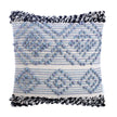 Blue tufted boho pillow with decorative fringe trim.
