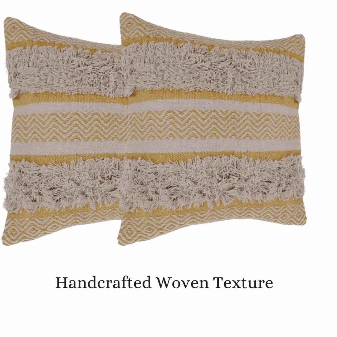 Handcrafted yellow textured pillows with woven detailing.
