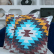 Aztec tribal throw pillow covers with geometric zigzag pattern in turquoise, mustard yellow, and burgundy—modern boho cushion covers for living room or bedroom decor.
