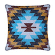 Square throw pillow featuring a vibrant Southwestern tribal design with geometric zigzag patterns in turquoise blue, mustard yellow, maroon, and black on a textured woven cotton fabric.