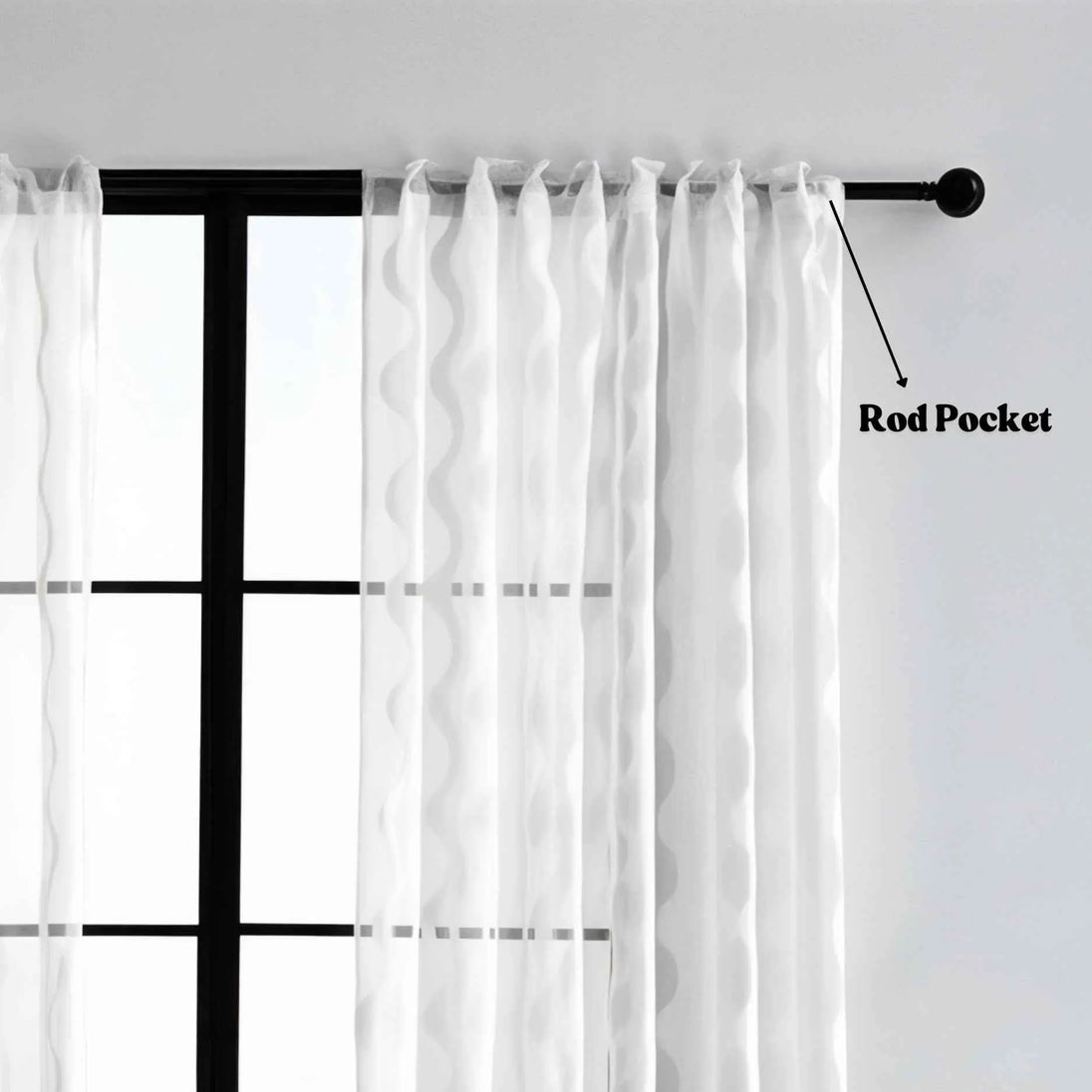 Sheer curtain with rod pocket on black curtain rod