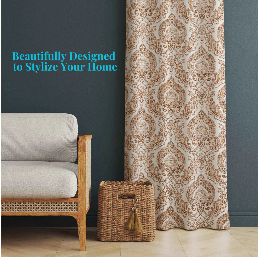 Brown damask curtain beside rattan chair and basket.
