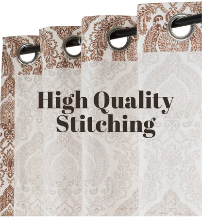 Close-up of brown patterned curtains with stainless steel grommets, featuring high quality stitching and elegant damask design for a refined home décor look.