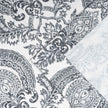 Close-up of gray damask print cotton curtain fabric .