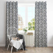 Gray damask curtains in bright cozy living space.
