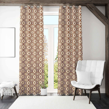 Modern living room with geometric patterned curtains, white armchair, and minimalist decor by a tall glass door.
