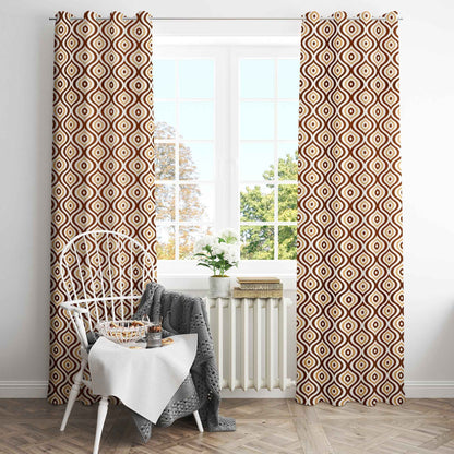 Cozy breakfast nook with brown geometric patterned curtains, white chair, table setup, and large window with natural light.
