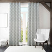 Modern geometric curtains in bright minimalist room.
