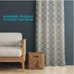Modern geometric curtains styled in cozy home decor.

