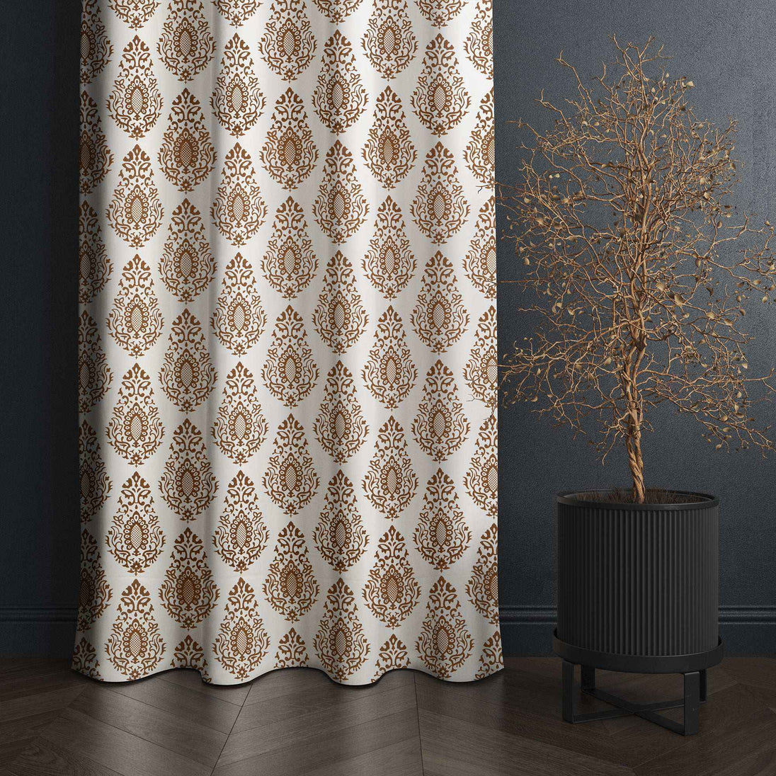 Brown damask curtain beside modern black planter







