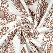 Twisted fabric with brown damask floral print

