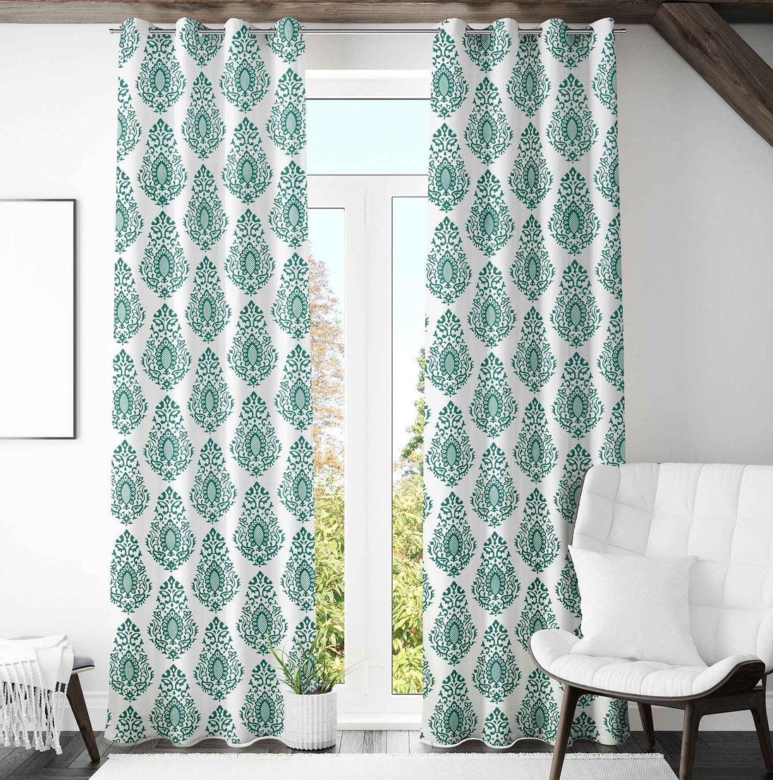 Green damask curtains brighten cozy attic living space

