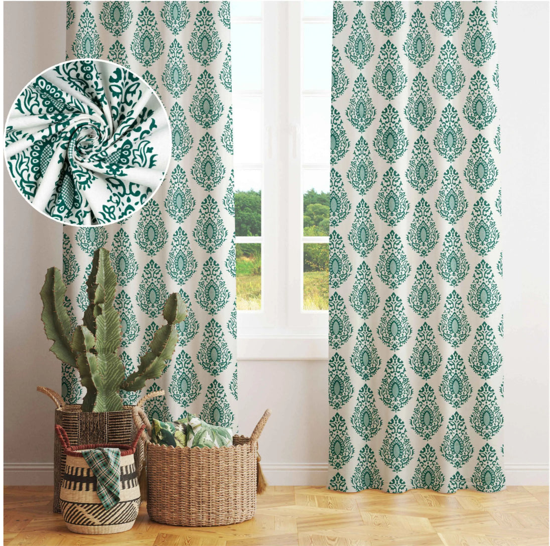 Green damask curtains with close-up fabric texture; styled with woven baskets and indoor plants.
