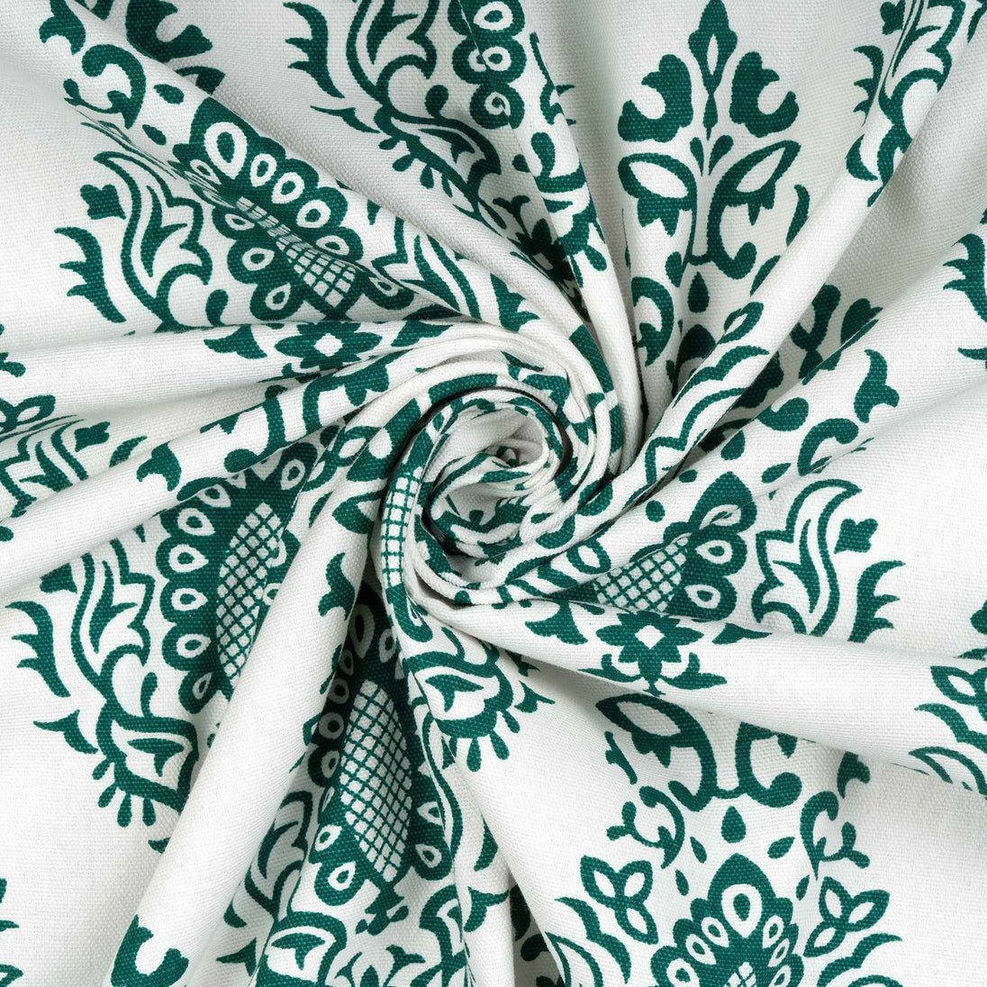 Green floral pattern on twisted white fabric.
