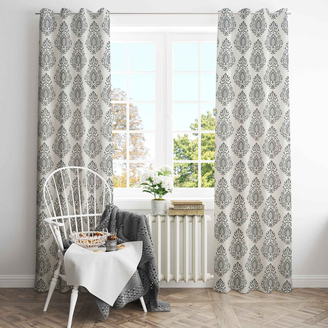 Gray damask curtains brighten elegant breakfast nook
