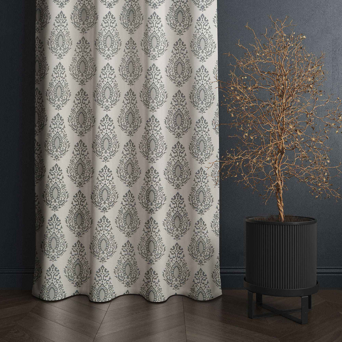 Gray damask curtain paired with black potted tree
