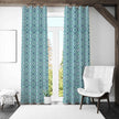 Blue patterned curtains in bright modern room
