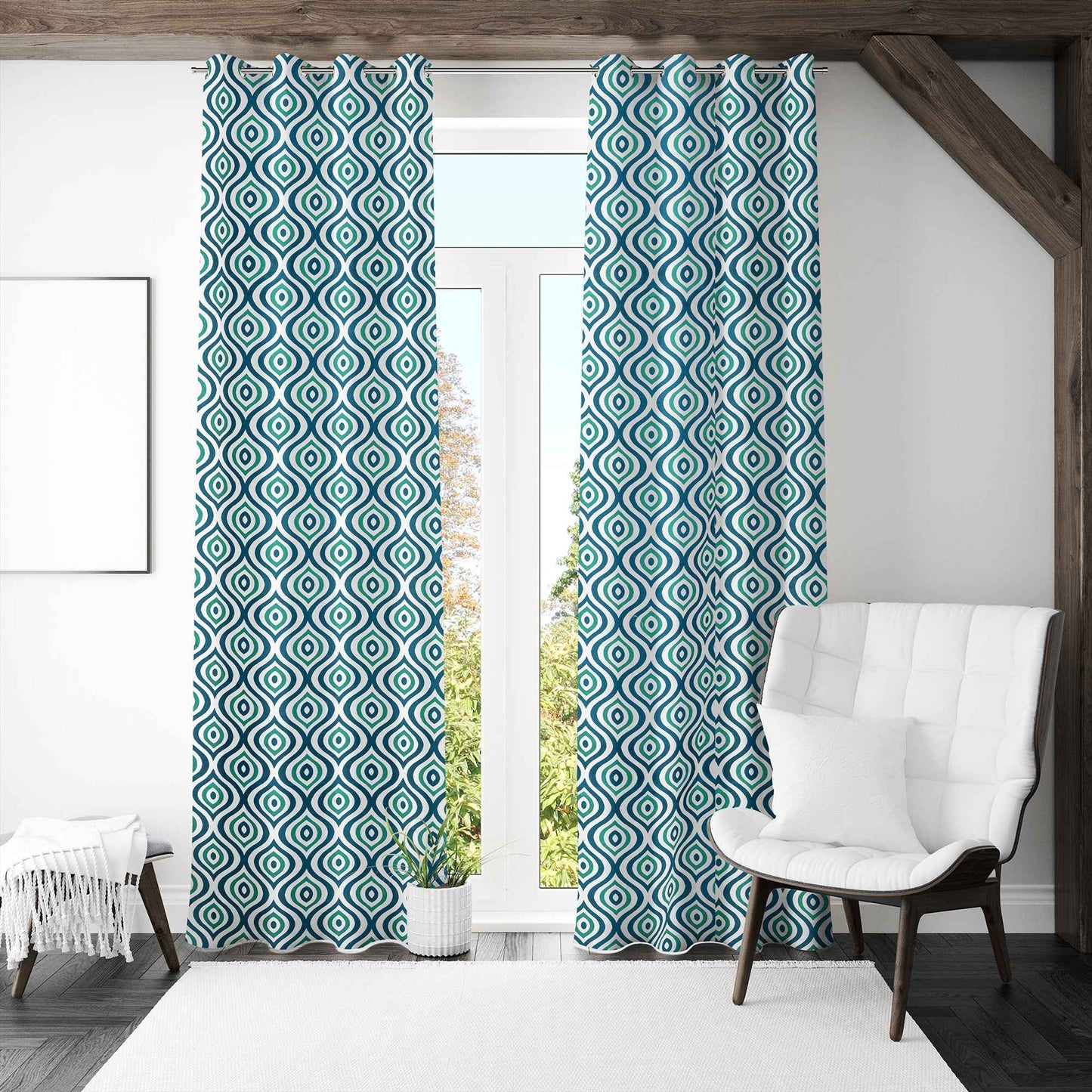 Modern living room with teal and black diamond patterned curtains, white armchair, and full-length glass door letting in natural light.
