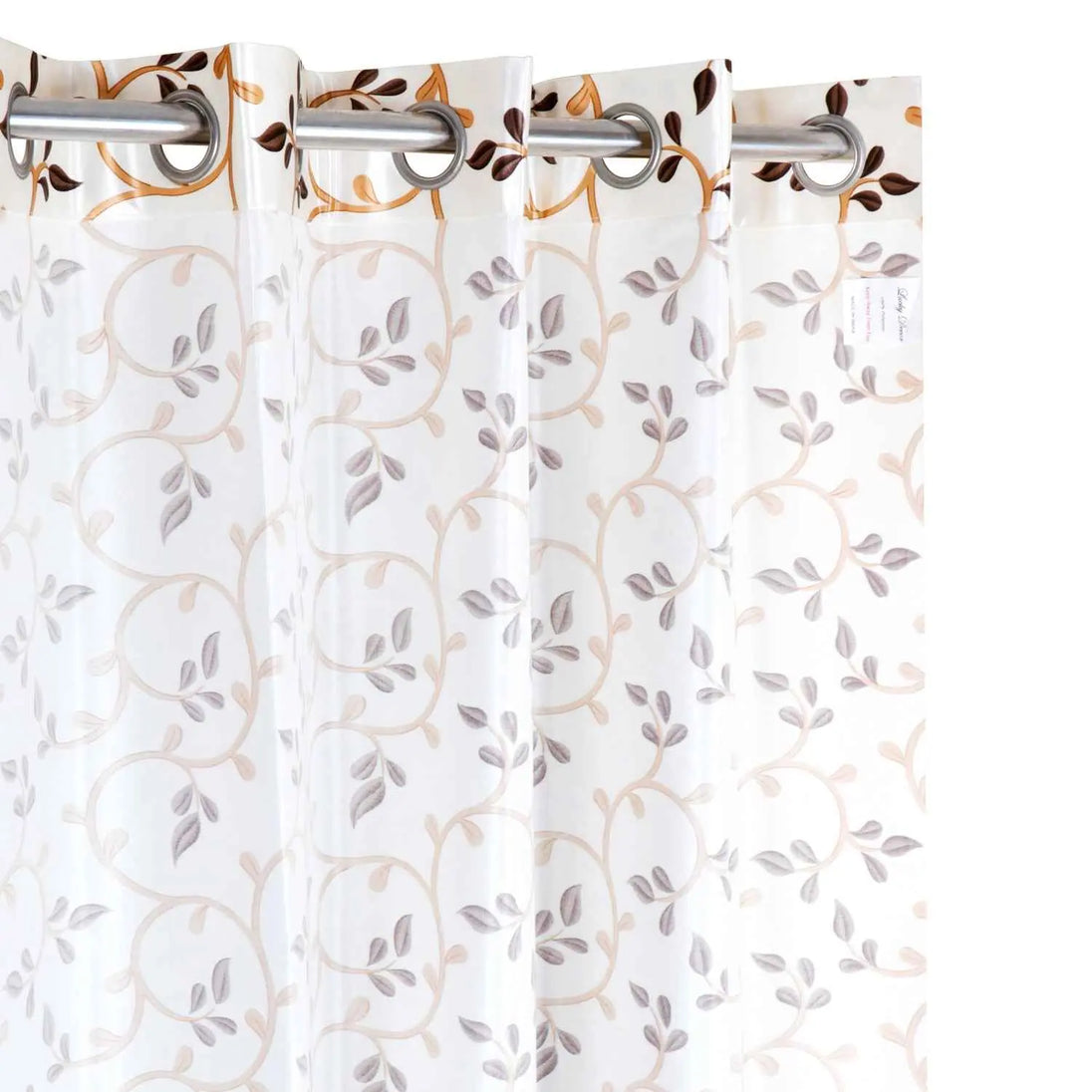 Light-filtering white curtains with subtle beige and grey vine and leaf print, 