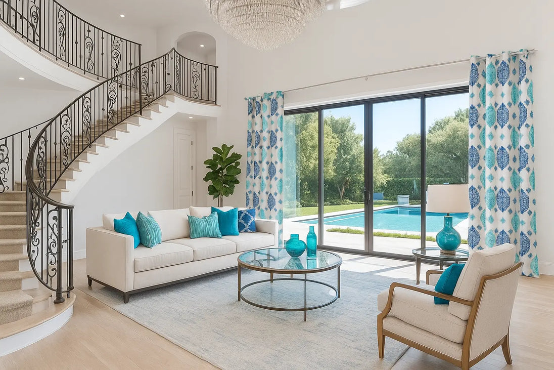 Bright modern living room with teal accent decor.
